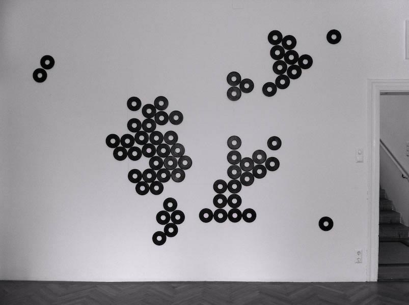 Swarm / QB. 1995. Sixty four units. 6”x6” each. Black vatican stone.