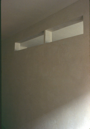 Integration by void. / DIATRETON. 1996. Void sculpture cut into the wall. 7’ x 12”x 7” deep.