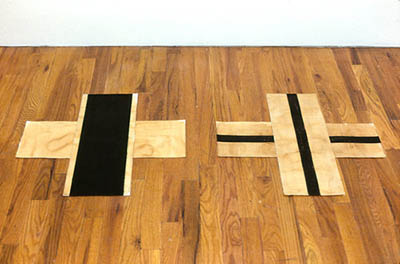 Water Over the Bridge. 1989. Floor drawing. Charcoal on stained paper. Four units, 8”x22” each.